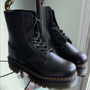 Dr. Martens Black Leather Boots with Yellow Accents
